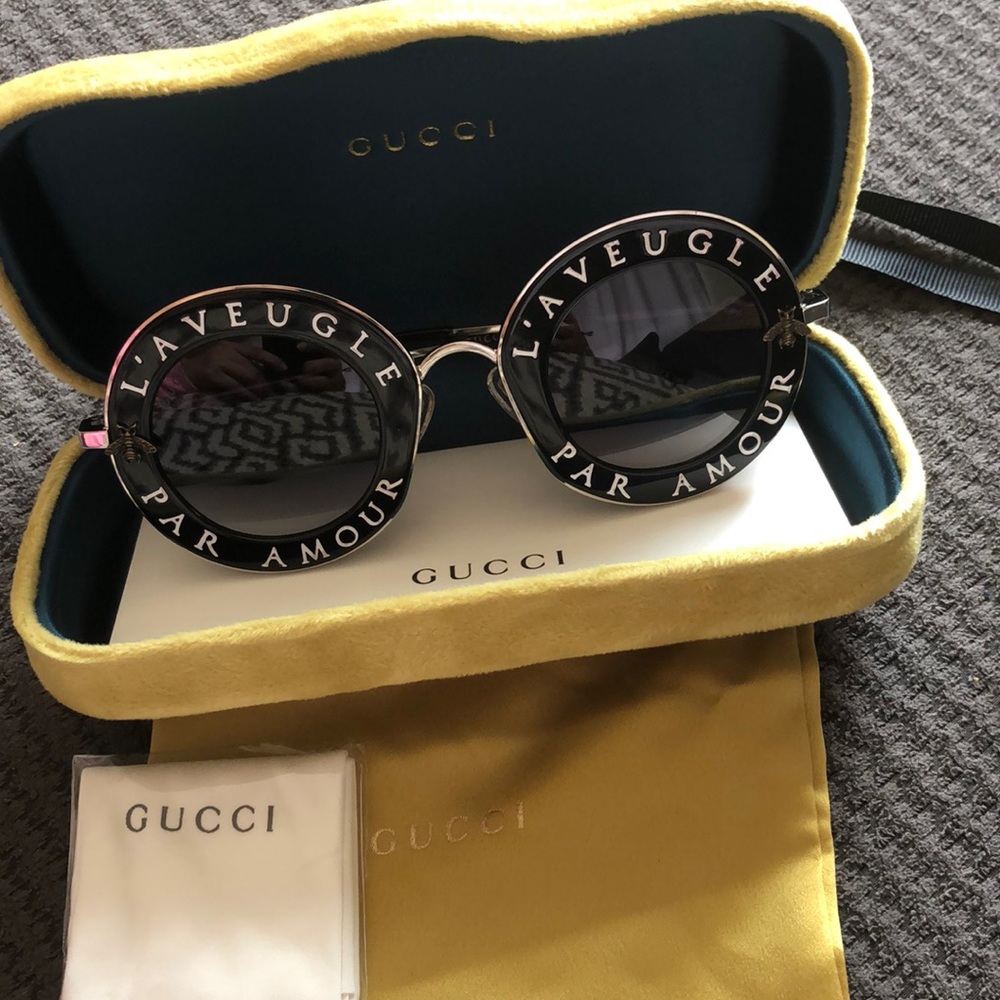 GUCCI Slogen printed round sunglasses